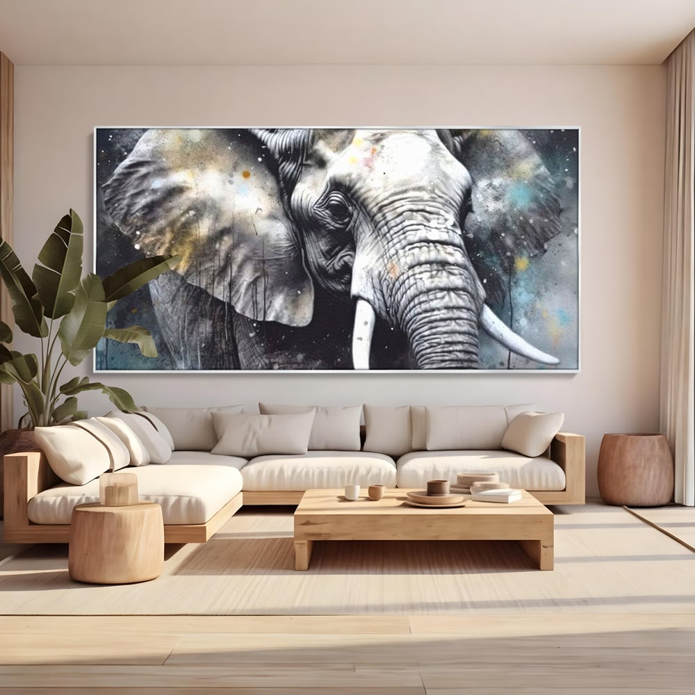 Tablou canvas cu tablou canvas cu cap de elefant, in rama de aluminiu argintiu, pe perete intr-un living